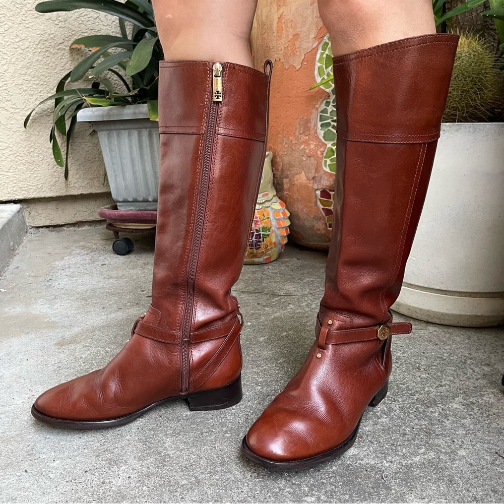 Reddish brown Tory Burch distressed leather riding boots